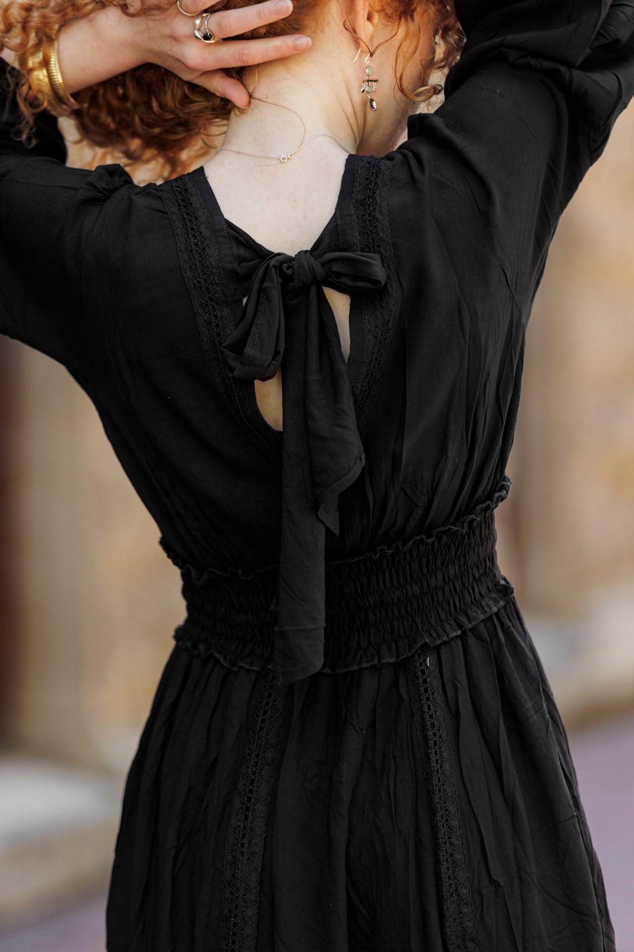 a dress featuring a bow at the back